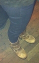 Her well worn Buffalo boots